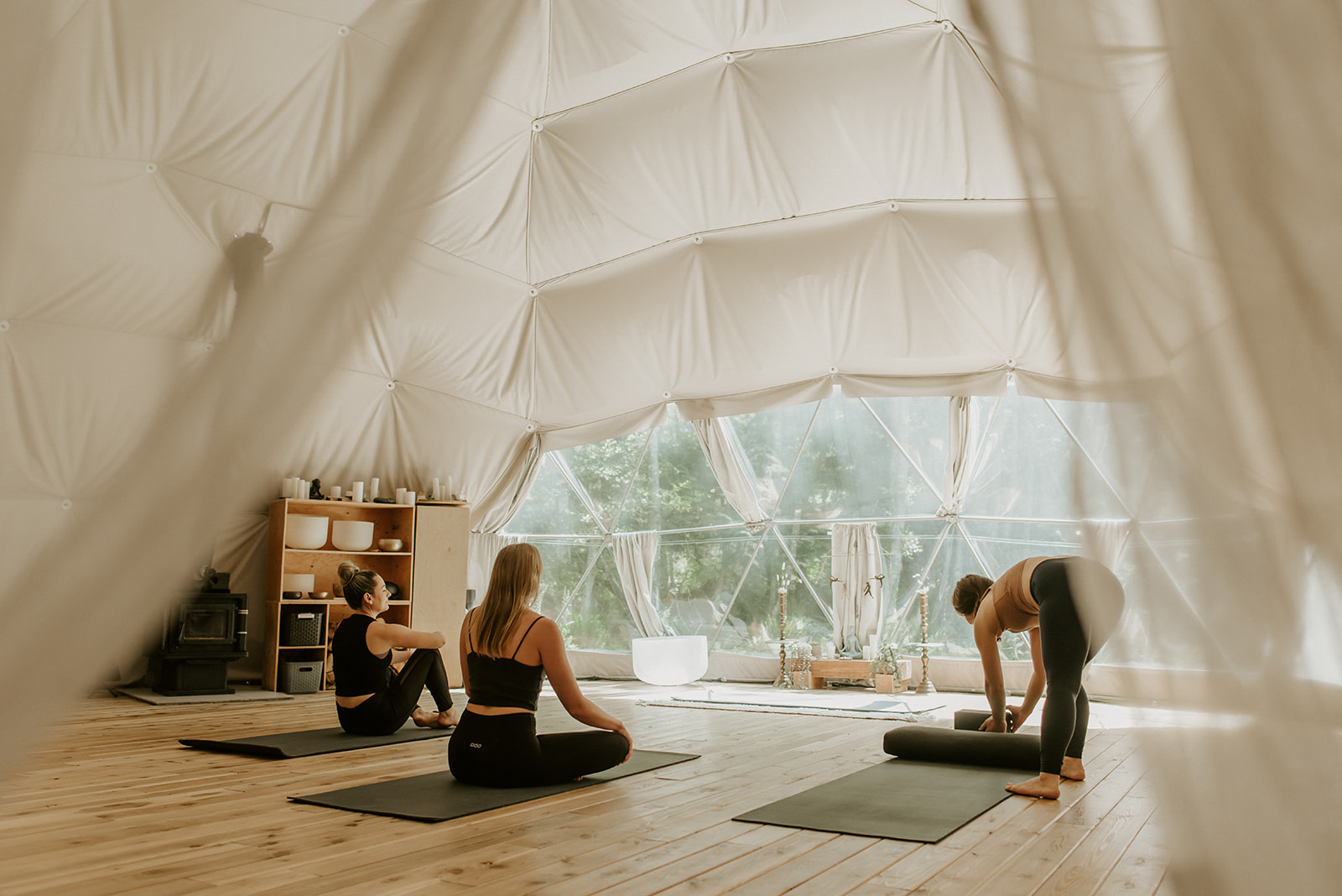 Yoga class inside the Nectar dome - women's retreat Bowen Island BC