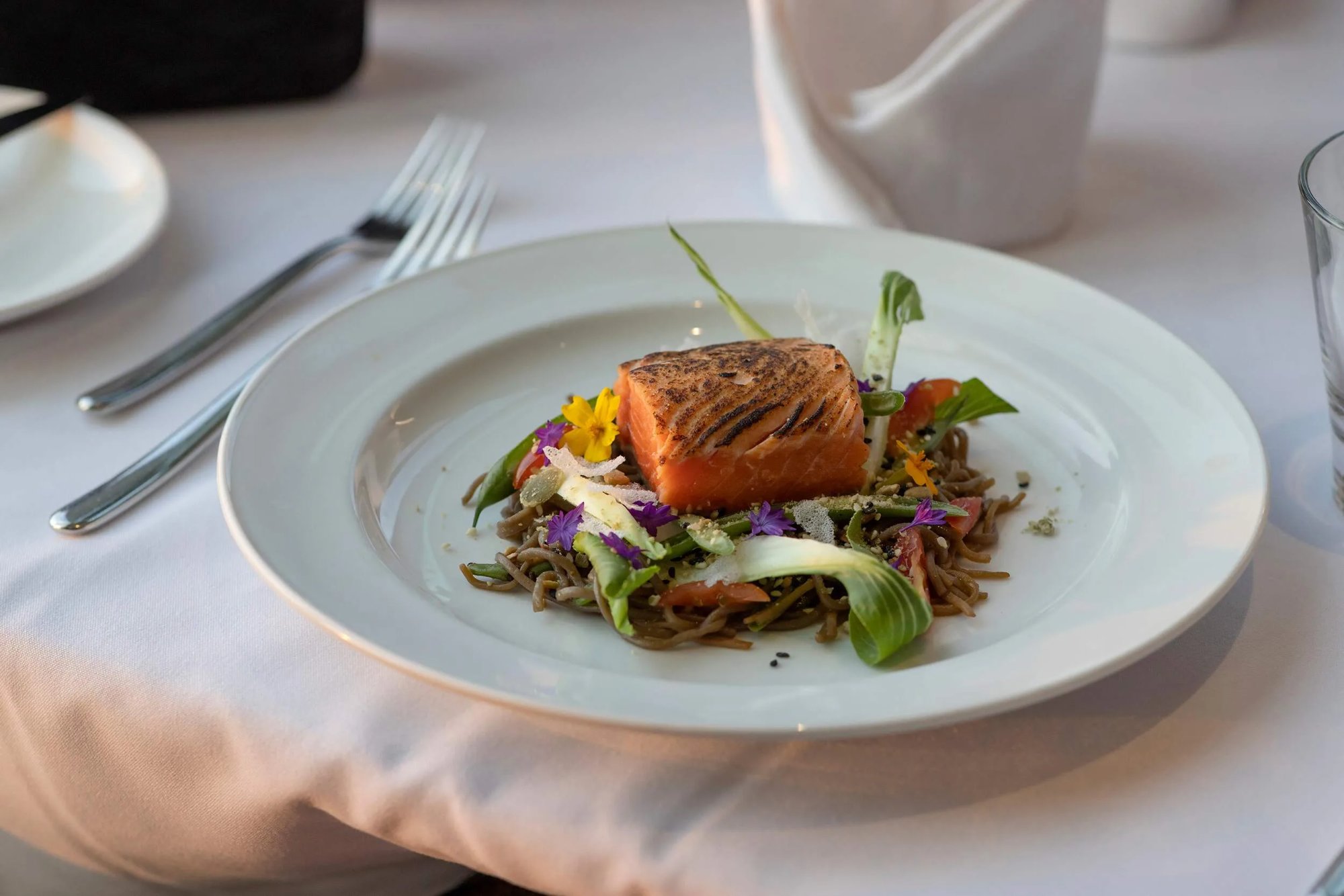 PeakFines restaurant at Sparkling Hill with crystal chandelier and fireplace